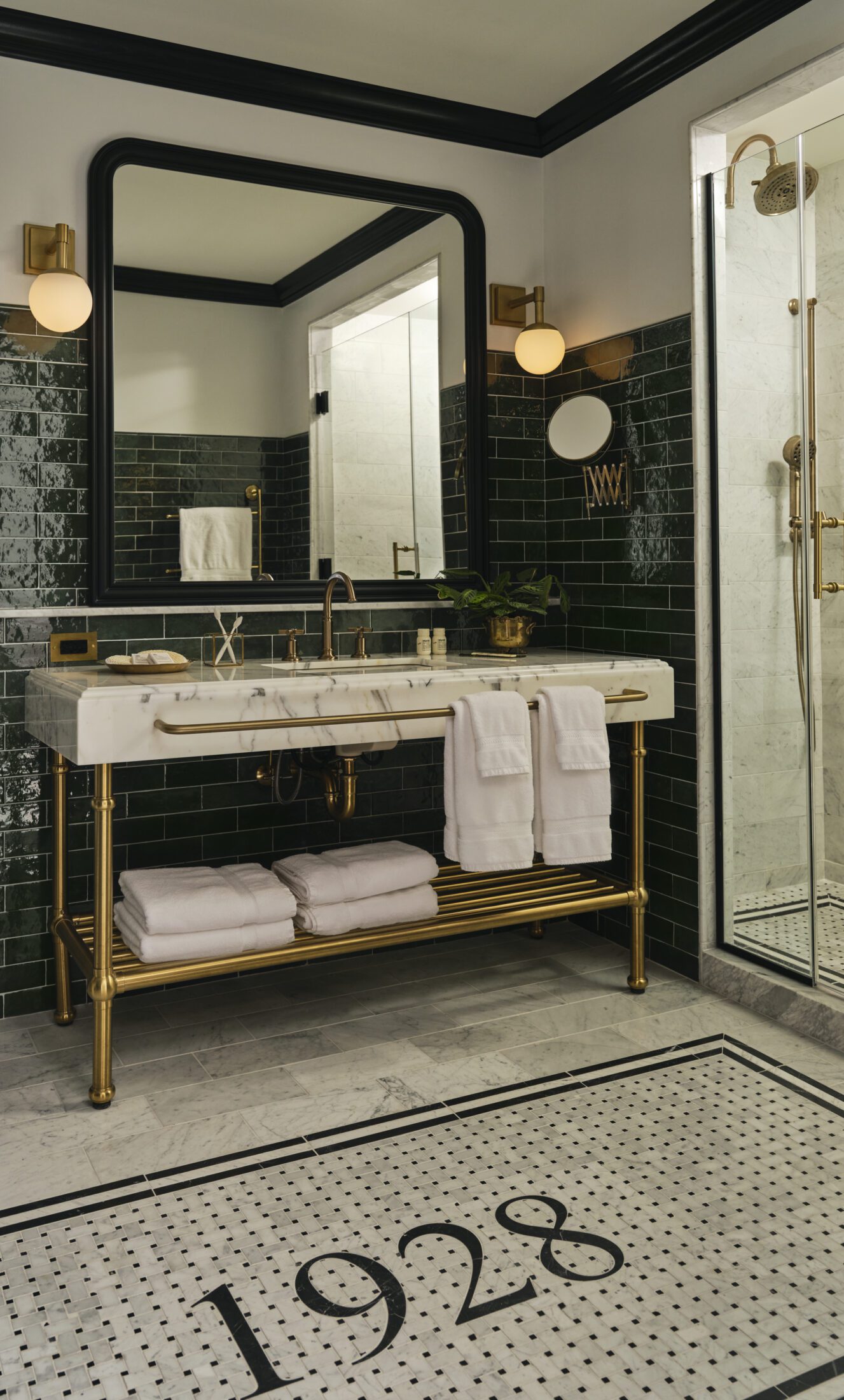 Ellsworth hotel bathroom vanity with mirror and tiled 1928 floor
